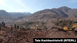 The landslide death toll was revised after rescue teams found another body amid the rubble.