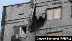 Обстріляні будинки на «Острові» у Херсоні