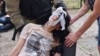 Russia Steps Up 'Brutal' Assault On Kharkiv, Raising Death Toll, Injuring Dozens