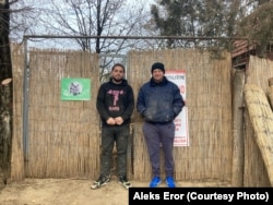 Dejan Gacic (right), the owner of the Vucjak Shelter, with one of its workers, Uros Rankovic.