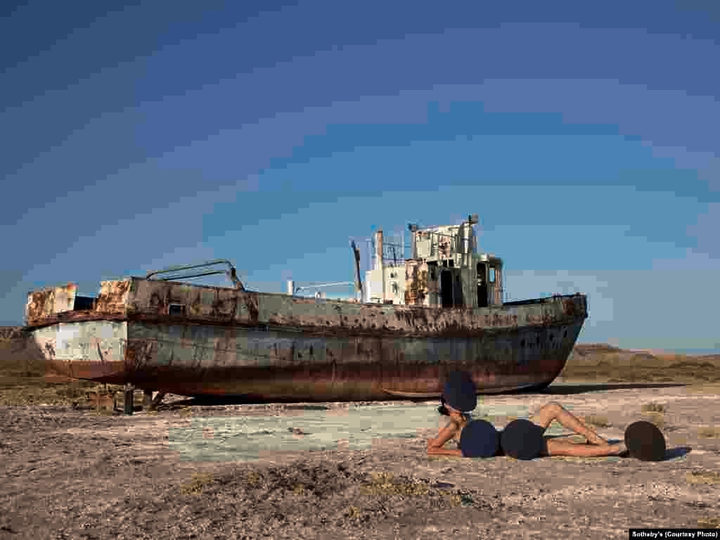 “The Aral Beach 2,” a 2011 lightbox photographic work by Almagul Menlibaeva (b. 1969) of Kazakhstan. Many of Menlibaeva’s works are motivated by deteriorating ecological conditions in her homeland.