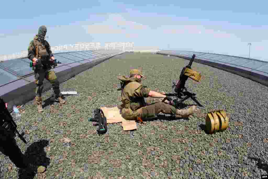 The militants set up a mortar launcher atop Donetsk's international airport.