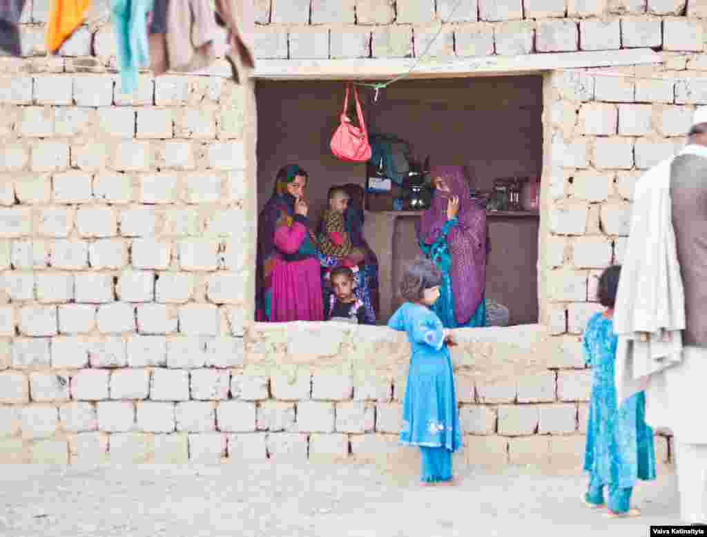 Latifa (left), a mother of five, was evicted from her home in Darra Adam Khel, a town in northwest Pakistan, where she had lived for nearly 20 years. 