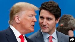 Дональд Трамп і Джастын Трудо. Архіўнае фота