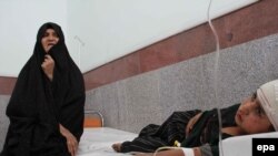 A girl who was injured by a roadside bomb gets medical treatment at a hospital in Herat in early July.