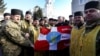 Президент України Петро Порошенко і військові капелани Православної церкви України біля кафедрального собору Святої Трійці в Луцьку, 15 січня 2019 року