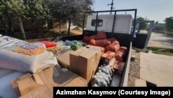Чек арадагы куралдуу кагылыштан жабыркаган кыргызстандыктарга Сафед-Булан айылынан чогулган жардам. Ала-Бука району. 17-сентябрь, 2022-жыл.