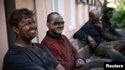 In eastern Ukraine, bosses and trade unions are urging workers to stand up to the separatists.