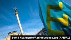 Празднование Дня крымскотатарского флага в Киеве, июнь 2017 года. Иллюстрационное фото