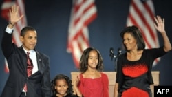 U.S. President-elect Barack Obama and family members appear on stage for his victory speech in Chicago.