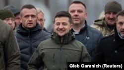 Ukrainian President Volodymyr Zelenskiy visits a section of a restored bridge, which was damaged during the military conflict between Ukrainian government forces and Russian-backed separatists, in the frontline town of Stanytsya Luhanska, on November 20.