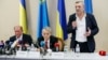 Crimean Tatar leaders Ilmi Umerov (left) and Akhtem Chiygoz (right) appear with Ukrainian lawmaker Mustafa Dzhemilev at a news conference Boryspil International Airport outside Kyiv on October 27.