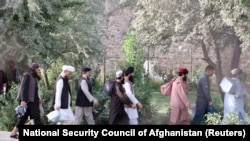 Newly freed Taliban prisoners leave a Kabul prison on August 13. 