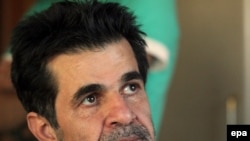 Filmmaker Jafar Panahi sits at his home after he was released on bail from Evin prison in Tehran in May.
