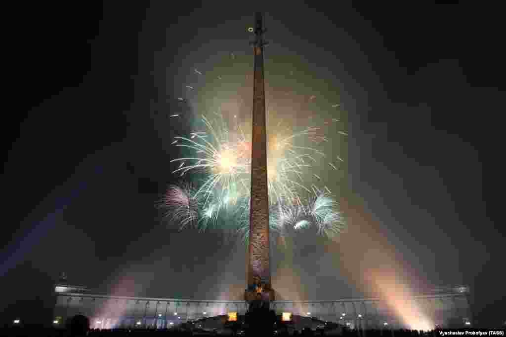 Fireworks go off over Poklonnaya Hill to mark Defender of the Fatherland Day in Moscow on February 23. Located at the Poklonnaya Hill is the museum of the Great Patriotic War, which features 14,143 square meters of exhibition space on the territory of a 2,424-hectare park. Located in the center of the square is an obelisk and a statue of Nike, the Greek goddess of victory.
