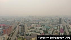 Smoke from wildfires covers Yakustk on July 19.