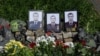 У Києві попрощалися з рятувальниками, які загинули через атаку Росії