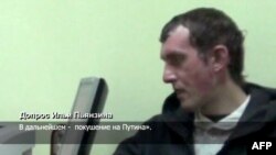 A Russian Channel One undated TV grab shows a man identified as Ilya Pyanzin, one of the suspected militants conspiring to kill Vladimir Putin, during an alleged confession to Ukrainian agents.