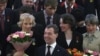 Olympians Rewarded, Officials Warned